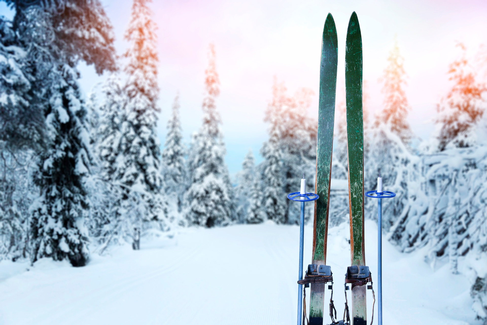Cross country ski trail with retro wood skis and ski pole