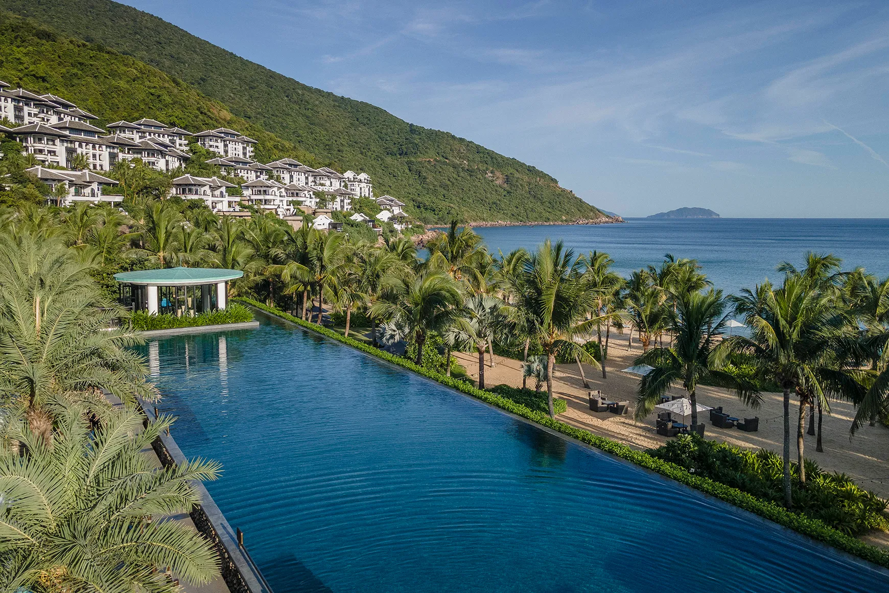 Asia, Vietnam, InterContinental Danang, pool view with beach and villas in the background