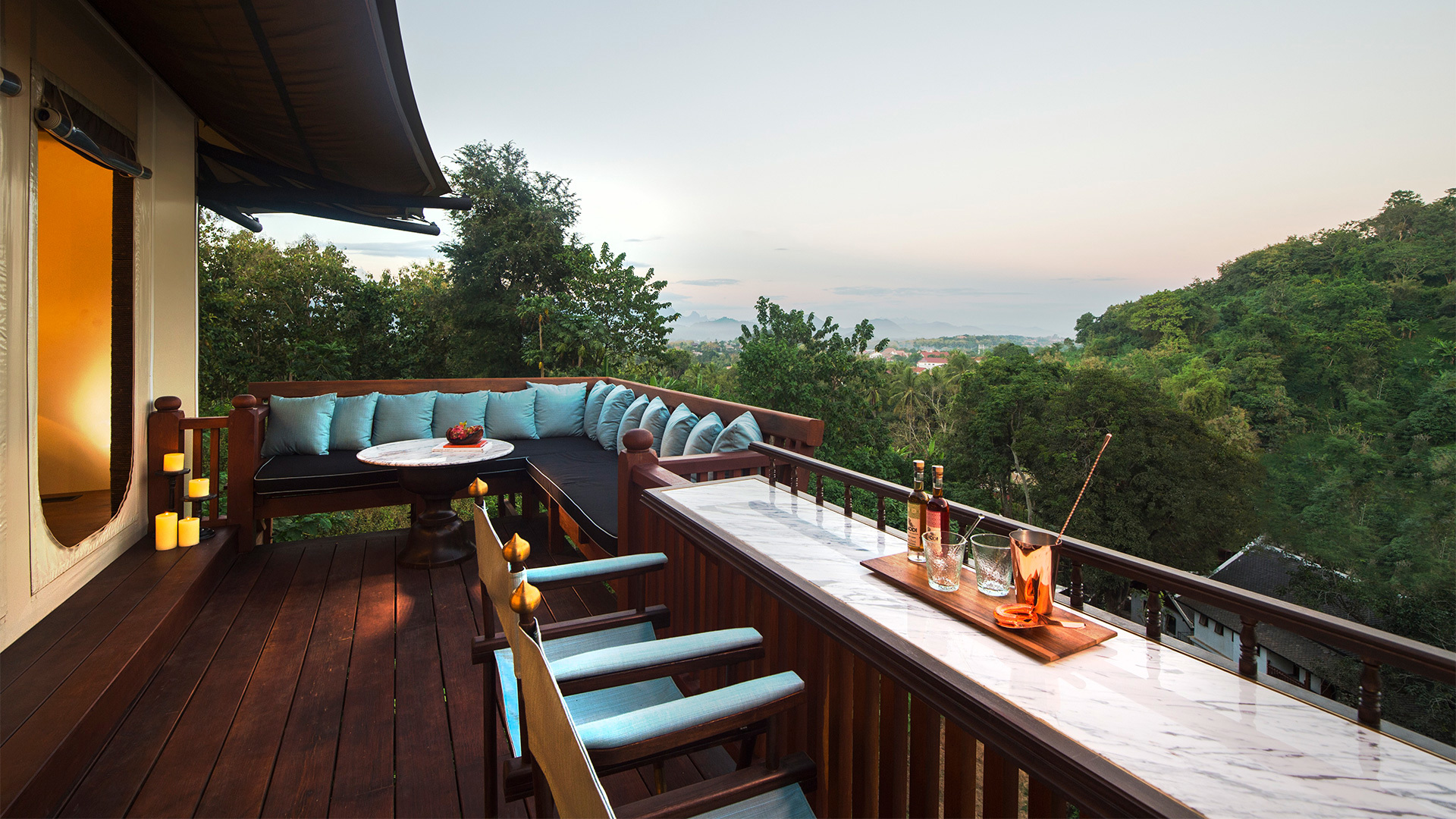 Balcony seating in Hilltop Tent at Rosewood Luang Prabang