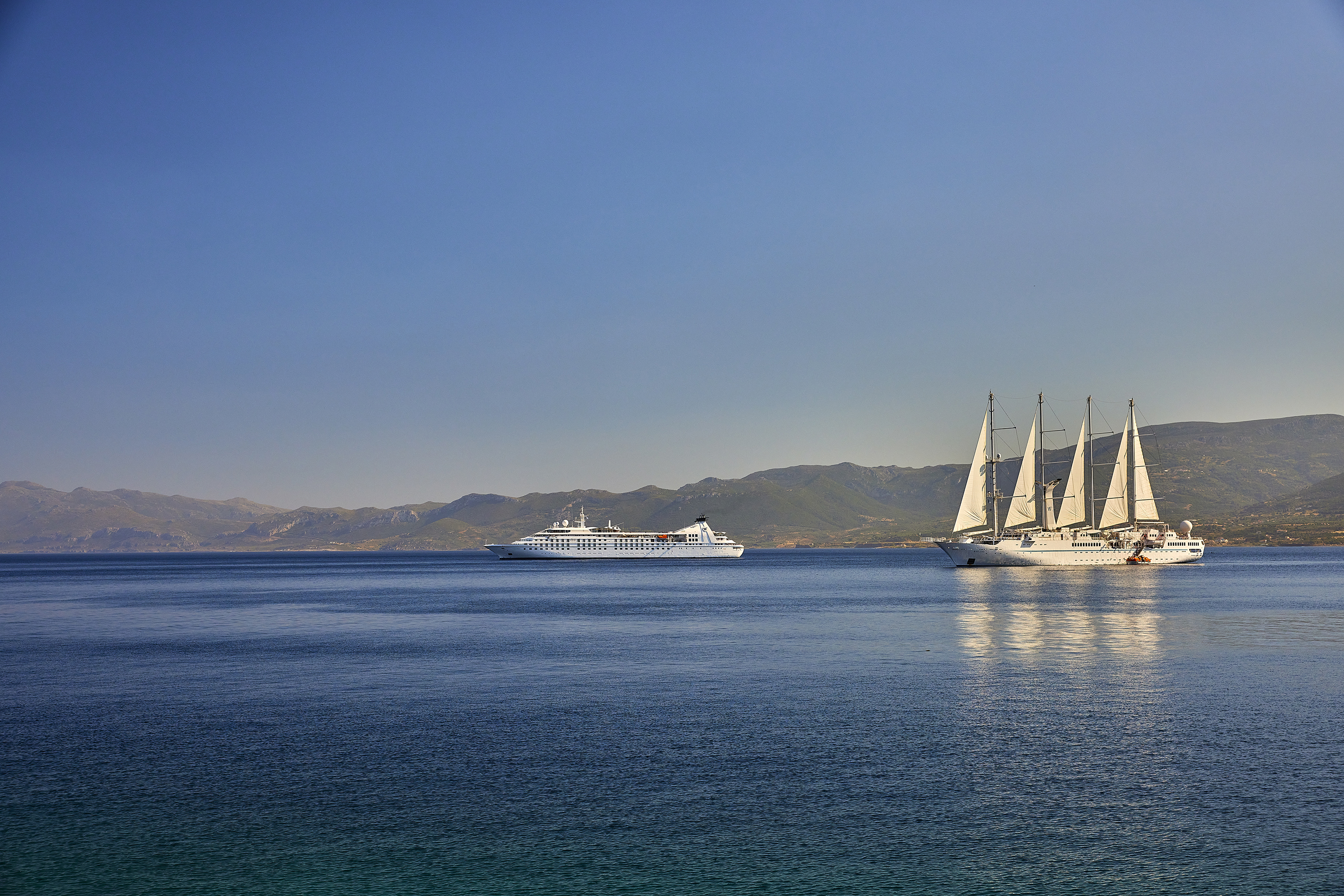 Cruises, Windstar, Windstar cruise and sail ships anchored in the ocean
