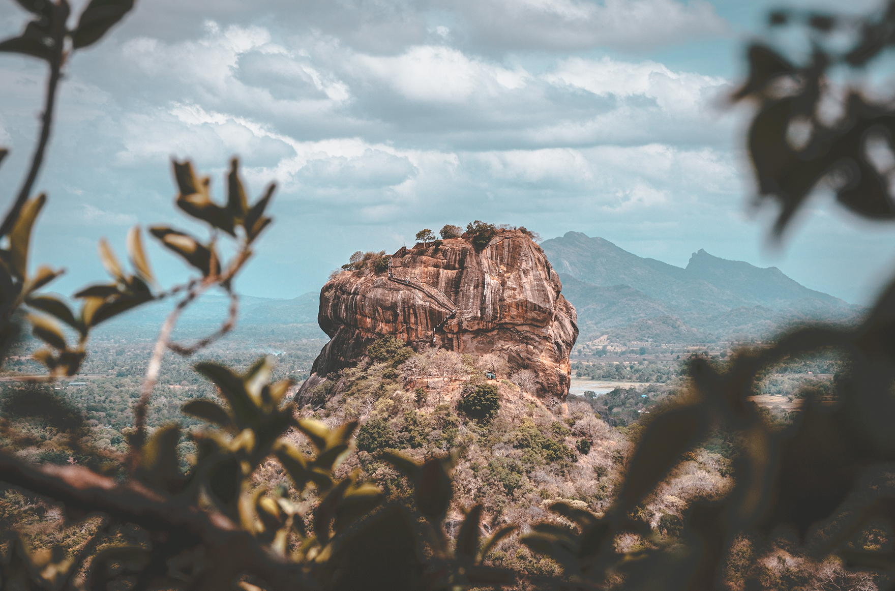 Sigiriya Rock Fortress photographed through trees