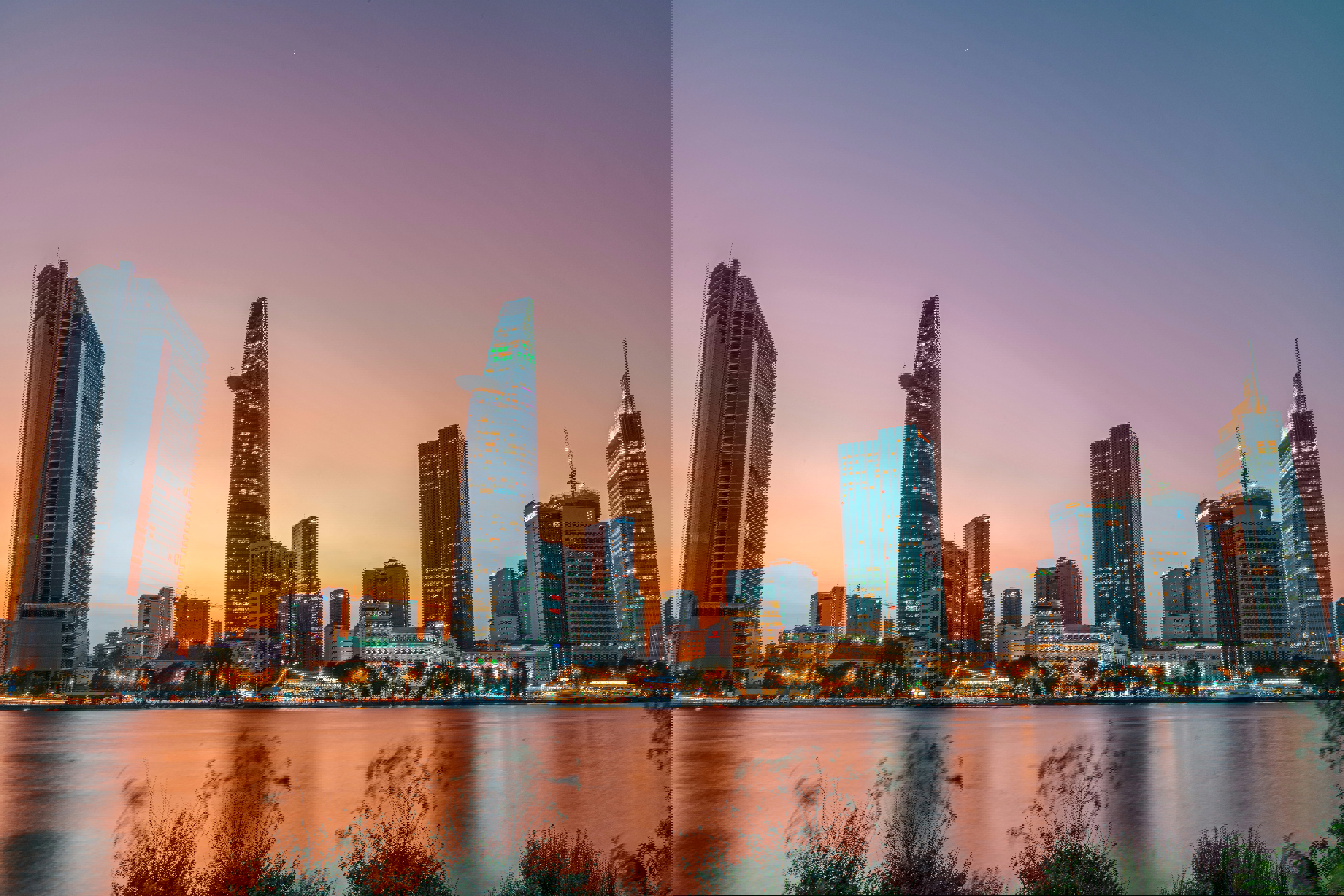 Skyscrapers along the riverbank at sunset in Ho Chi Minh city