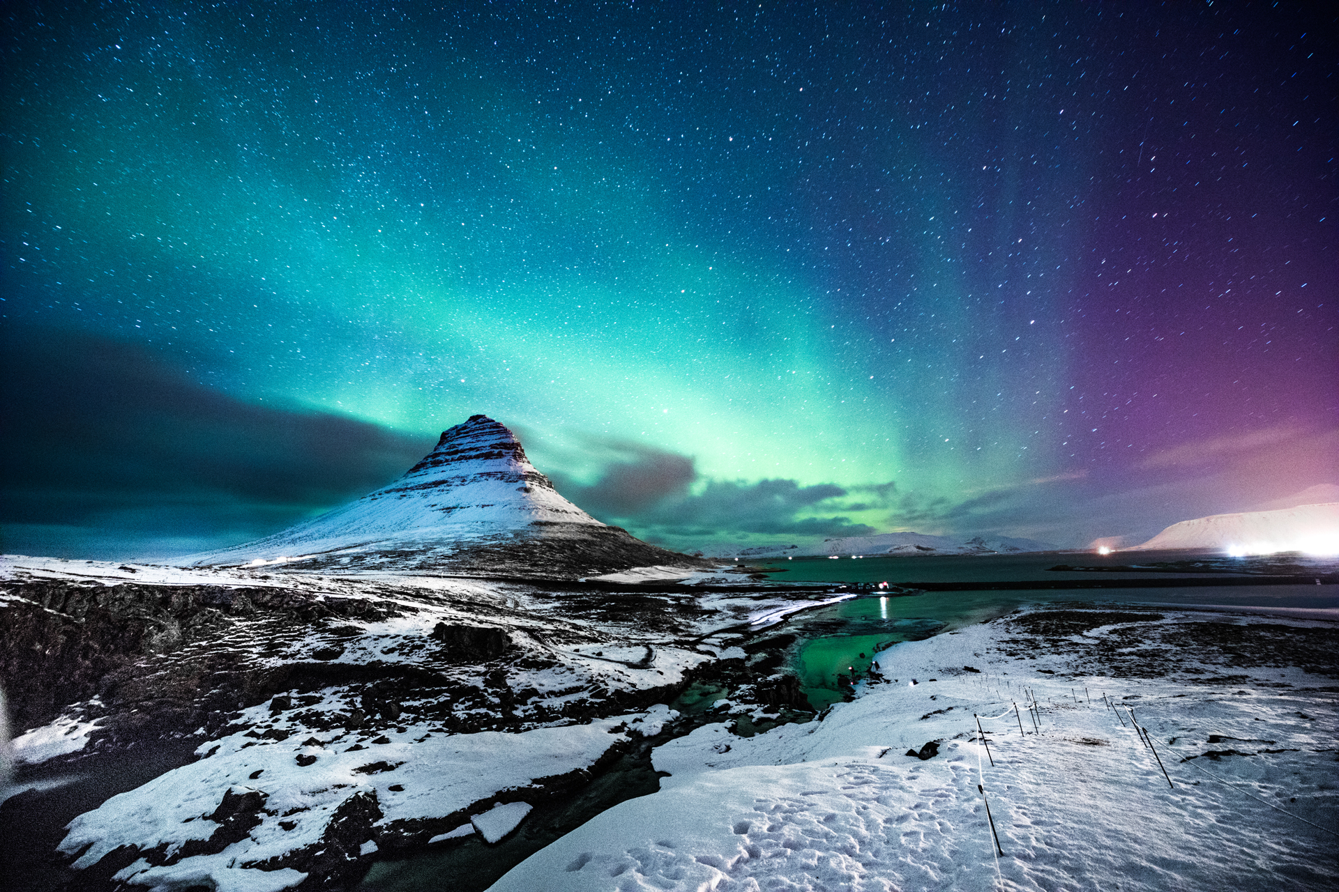 Northern lights over snowy Mount Kirkjufell Iceland