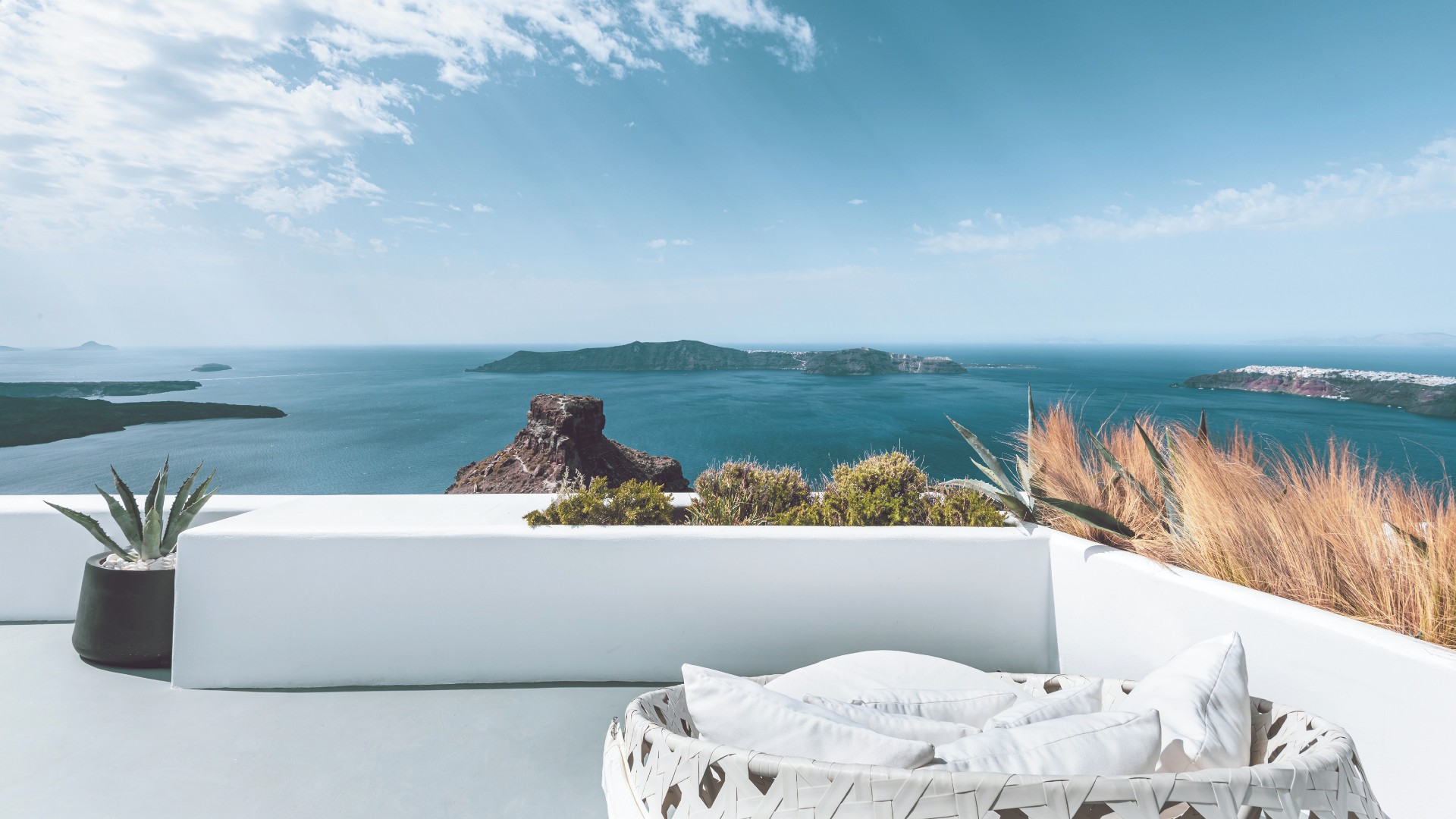 A Cliff Top Retreat In Santorini