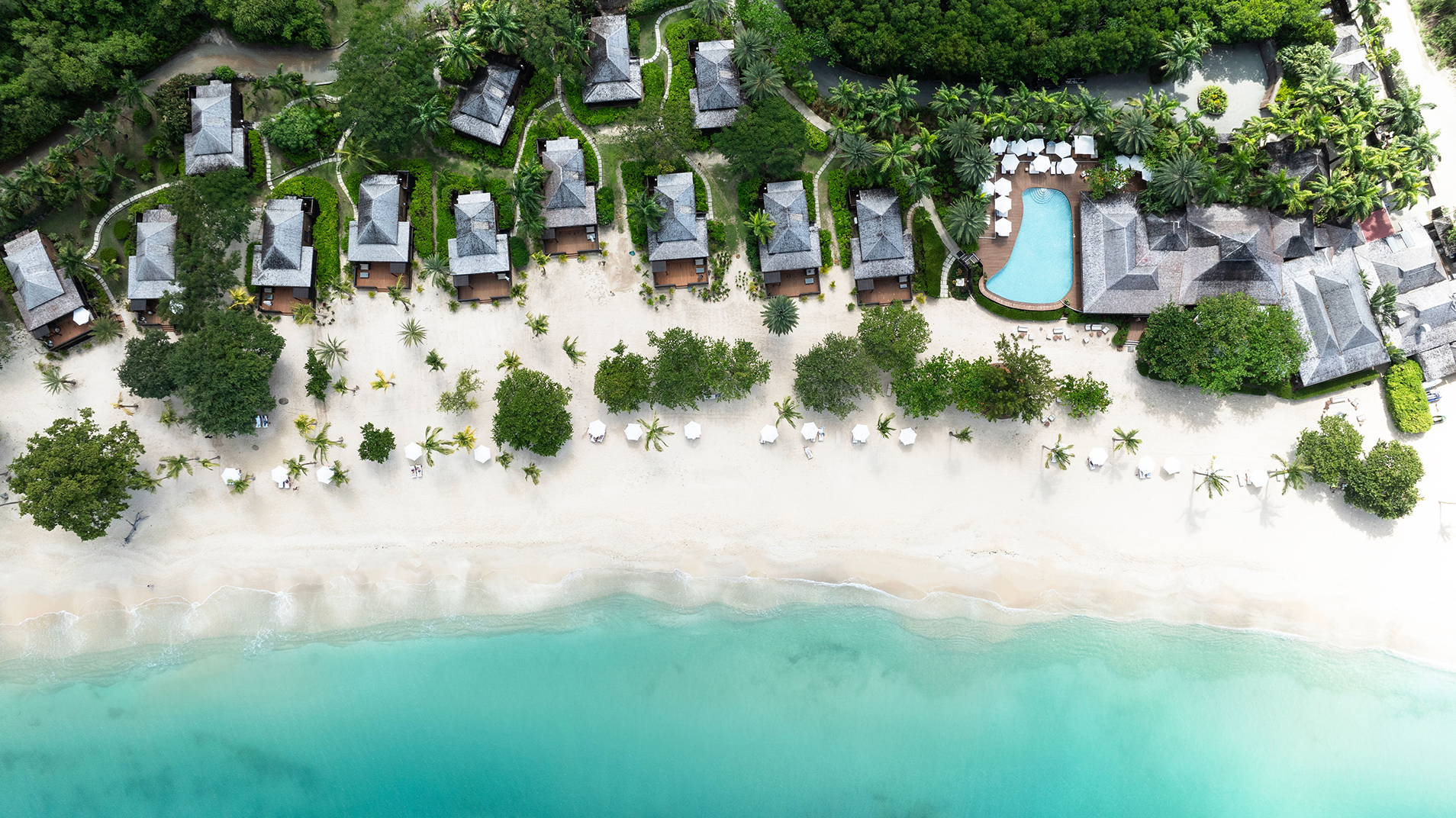 Caribbean & Mexico, Antigua, Hermitage Bay, arial view of the beach and beachfront villas