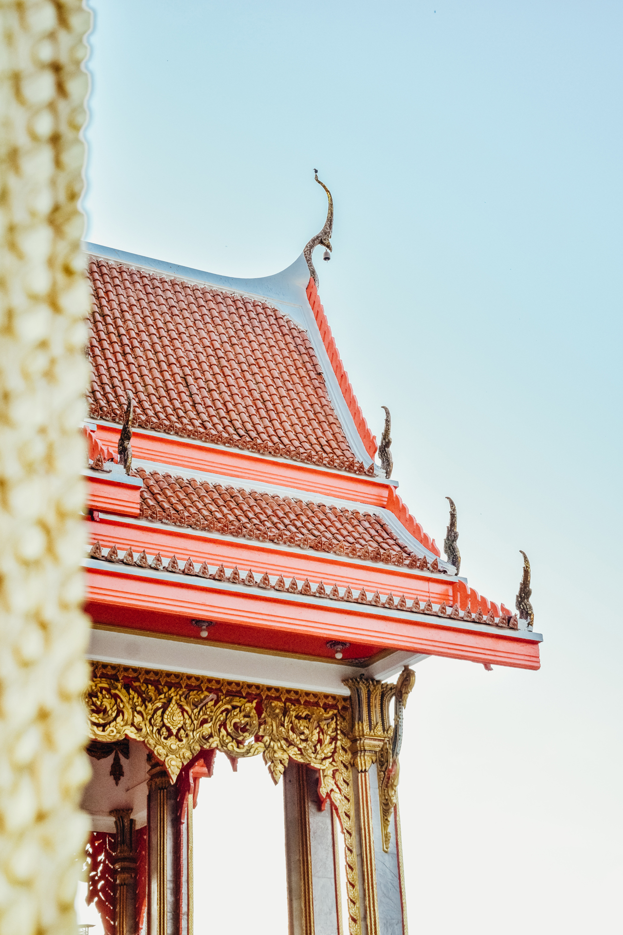 The corner of a temple roof in Thailand